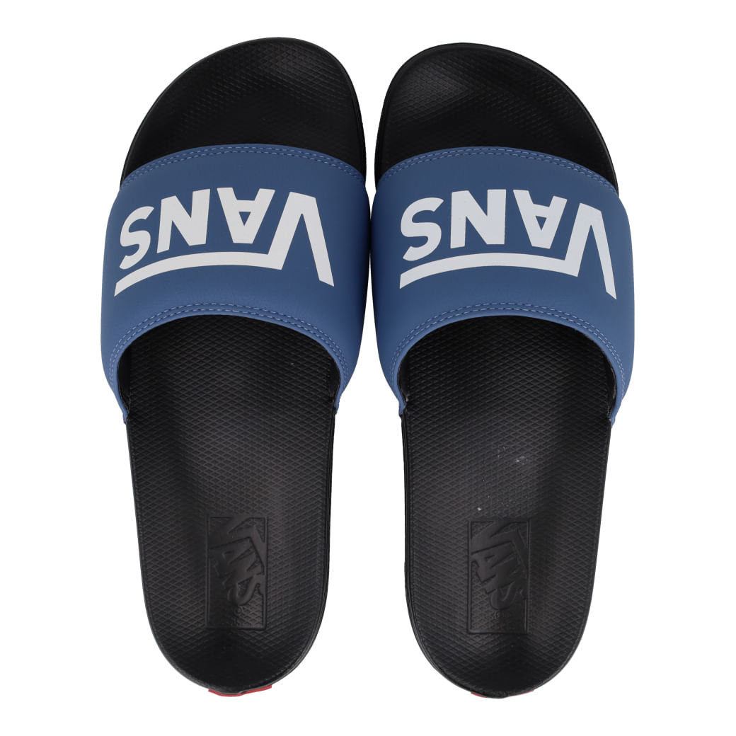 Vista superior do chinelo slide Vans azul masculino mostrando design e logo